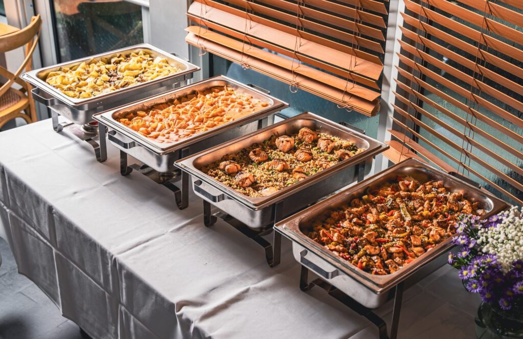 Grand Cafe kosher catering hot trays in chafing dishes